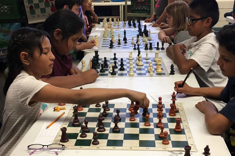 kids playing chess openingmaster